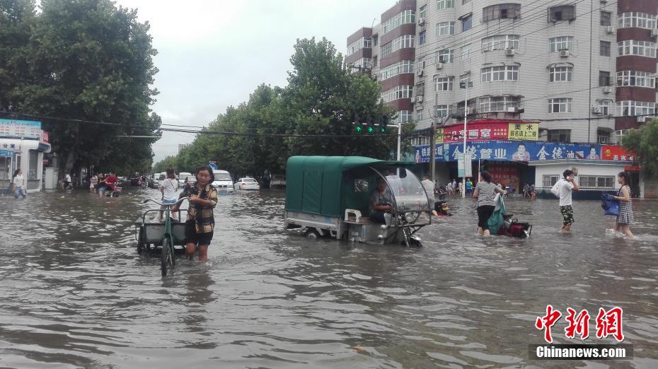 河南暴雨最新消息與小巷風(fēng)情小店更新